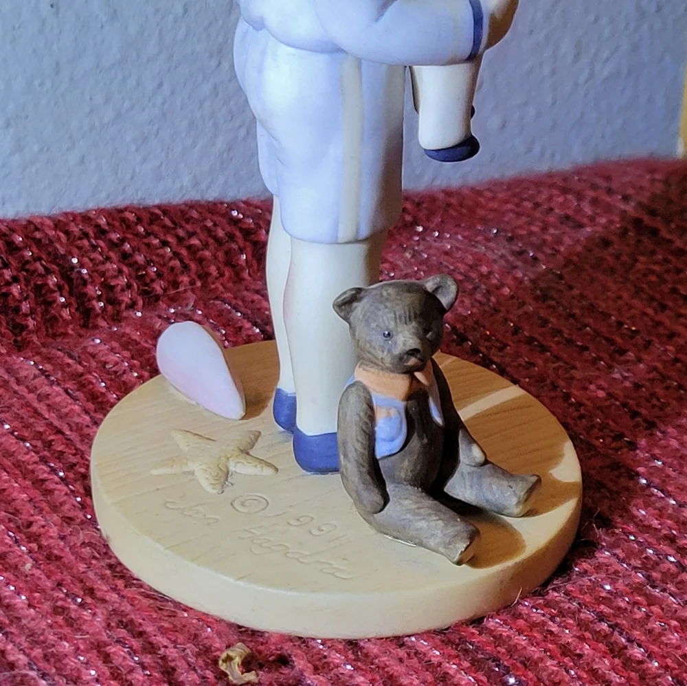 VINTAGE PORCELAIN BOY WITH DOLL FIGURINE 